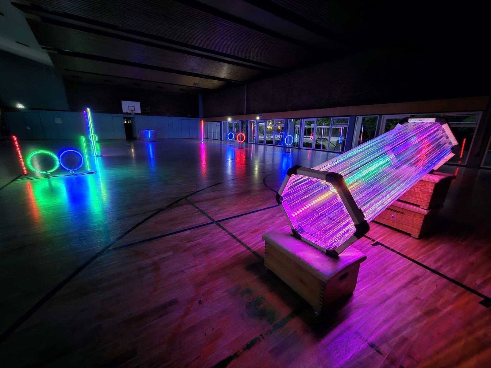 A WhoopTrack FPV course with illuminated LED gates driven by RaceLink
